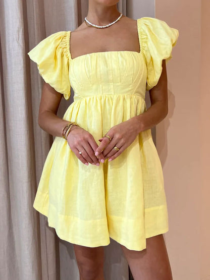 Puff sleeve mini dress in yellow